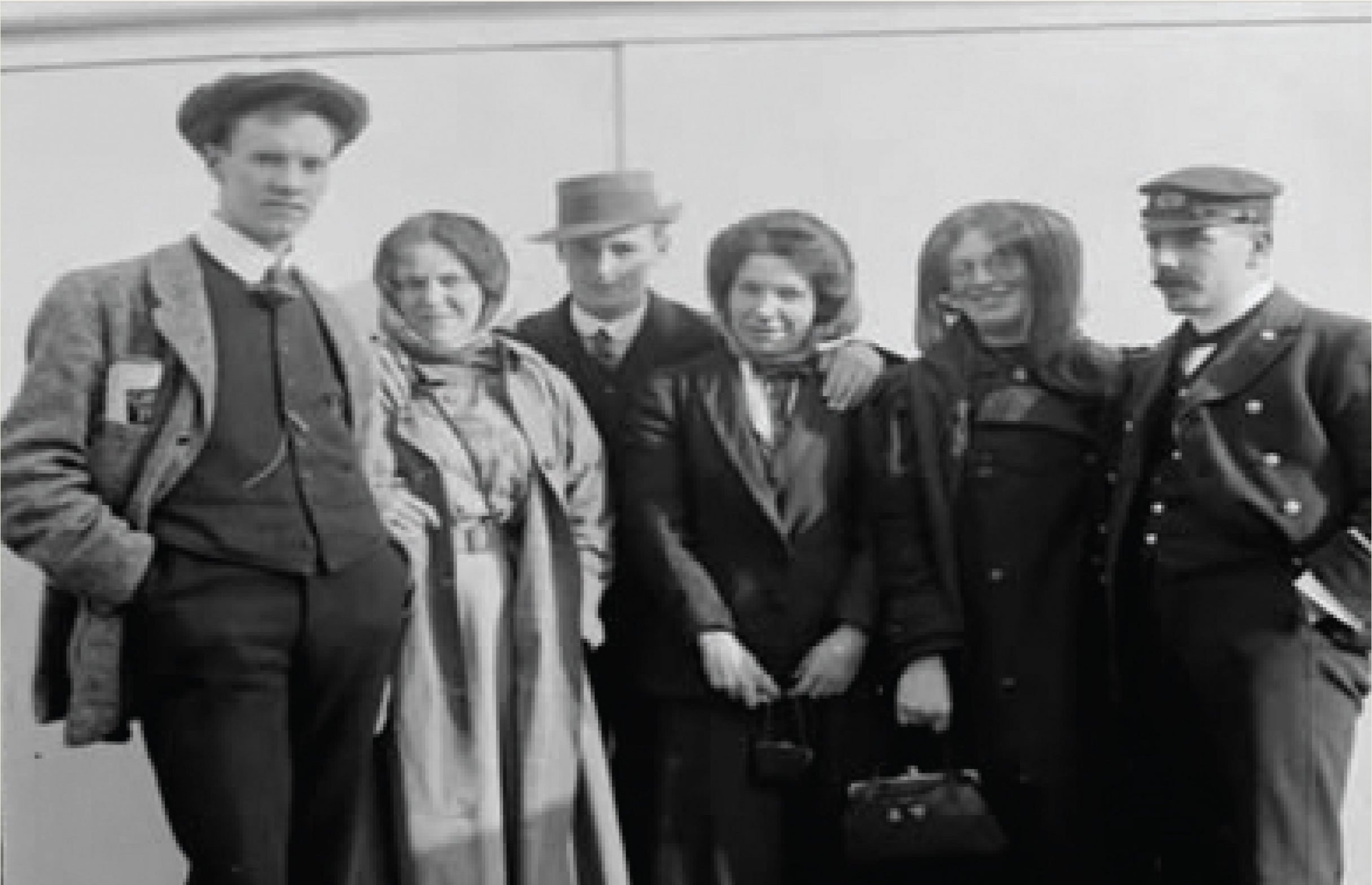 Three Scottish couples pose together for a photo before they depart on a ship to Canada.