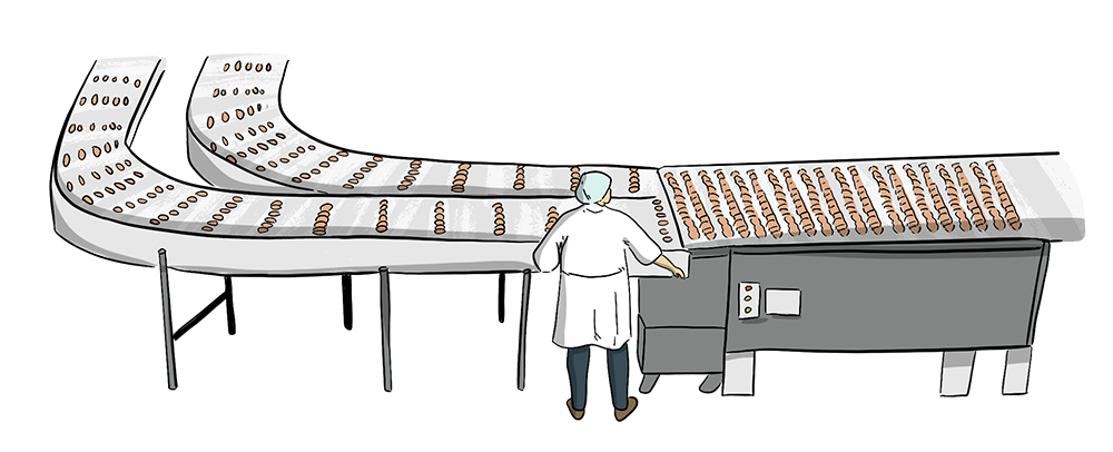 An illustrated factory worker stands next to a large manufacturing line that has many lines of crackers on it.