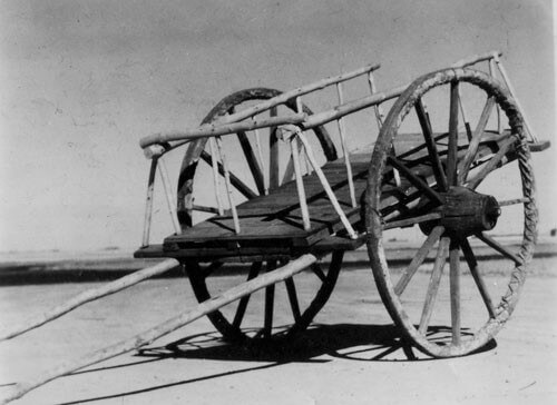 A piece of art by Leah Marie Dorion made with mosaics shows two Indigenous women facing each other with their hair blowing out behind them. There is a sun with butterflies in the centre, and snakes underneath the ground.