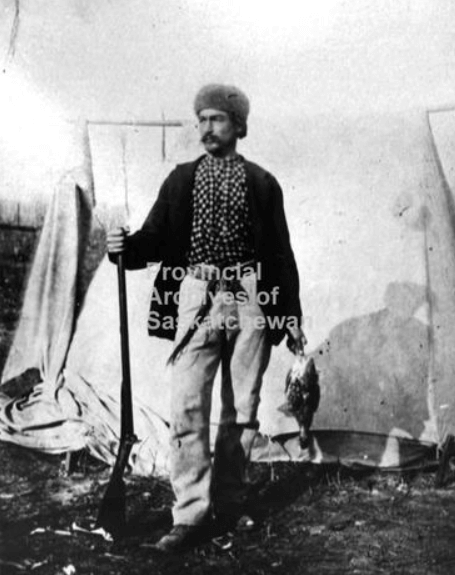 A piece of art by Leah Marie Dorion made with mosaics shows two Indigenous women facing each other with their hair blowing out behind them. There is a sun with butterflies in the centre, and snakes underneath the ground.